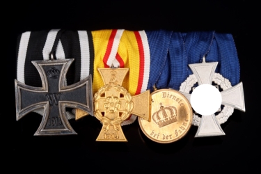 Large medal bar with 4 awards, including Lippe War Merit Cross on ribbon